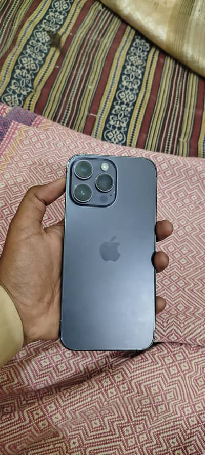 I phone 14 pro max deep purpole 128 jv 94 health water pack