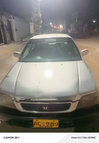 good looking car original paint tyre 80%