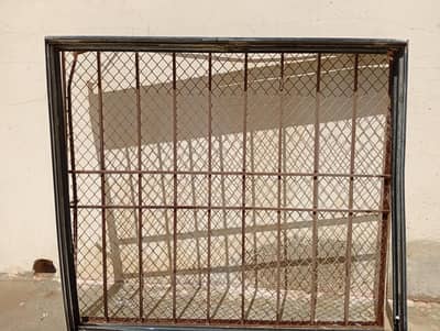 Almunium window with strong iron grill