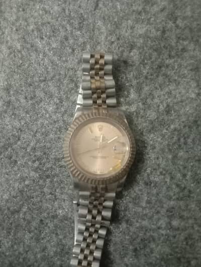 rolex but damage real price is 15lac