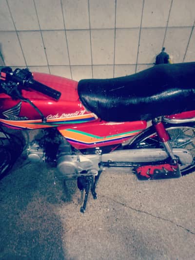 iam selling  honda70c jenion  my name  First  owner