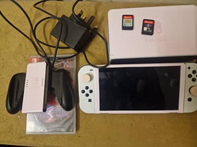 Nintendo switch oled with 2 games