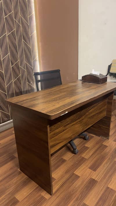 Office table with rolling chair