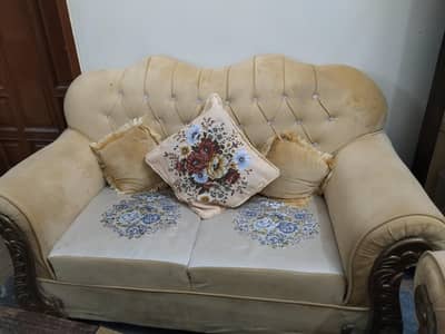 sofa set in gold color