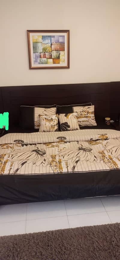 King Size lower bed with 2 side tables