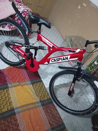 Caspian New Cycle With Front And Center Shocks
