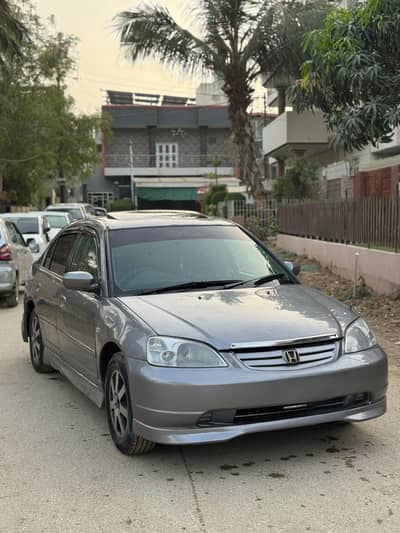 Honda Civic 2003 VTi UG (Cat Eye)