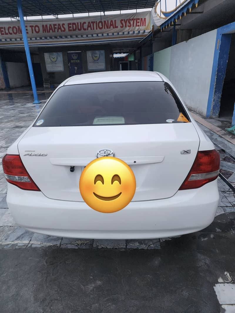 Corolla Axio 7/12 1