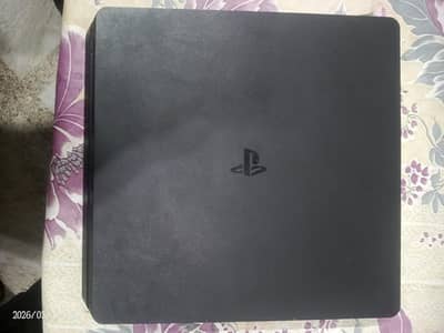 play station 4 slim 500 gb + a bundle of games