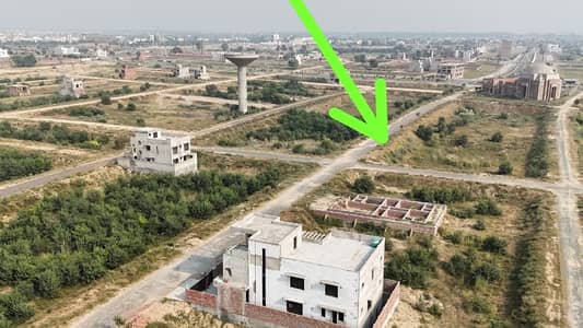 20 Marla Plot New Lahore City 50ft Road Main Boulevard Near Play Ground & Attached Bahria Town All Deus Clear Possession Paid