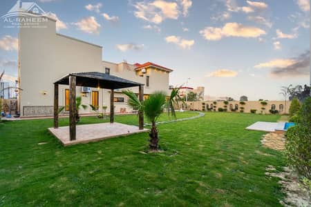 Spanish Style One Kanal Brand New BUNGALOW KANAL LAWN NEAR RAYA