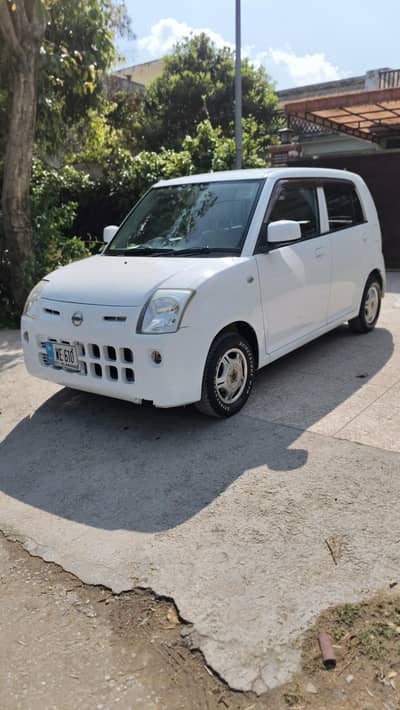 Nissan Pino total geniune