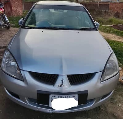 Lancer 1.3 cc . . 03230015855