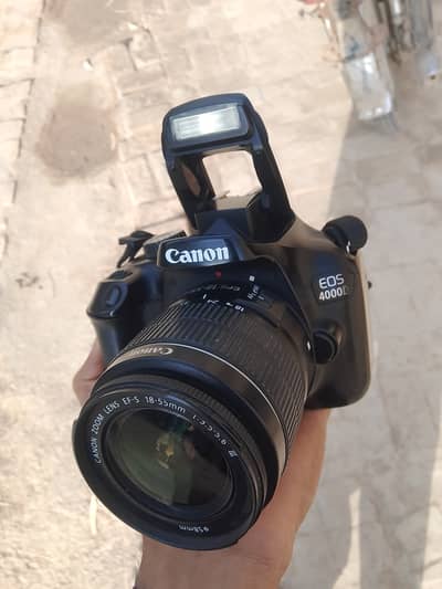 **Title:** Canon EOS 4000D DSLR Camera + 2 Lenses (Excellent Condition
