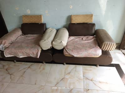 A brown, skin 5 seaters sofa set ready to sell