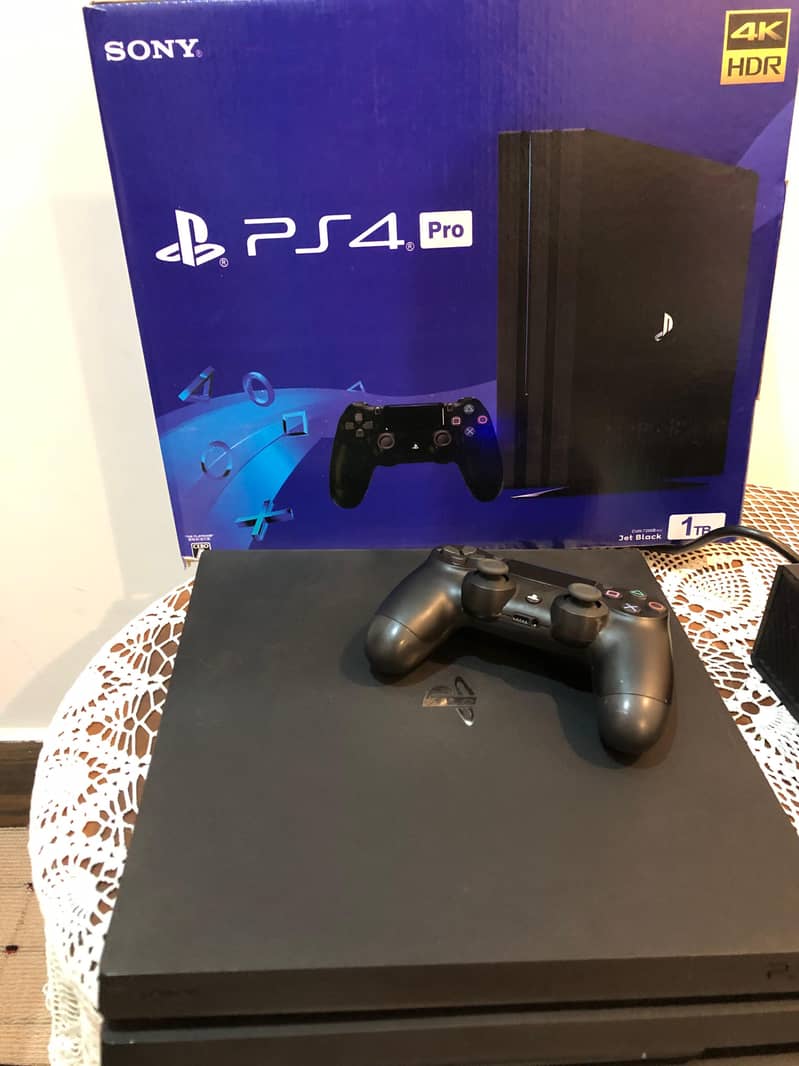 PS4 pro 1tb with original controller 1