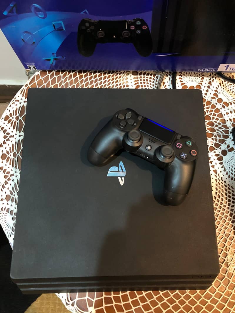 PS4 pro 1tb with original controller 2