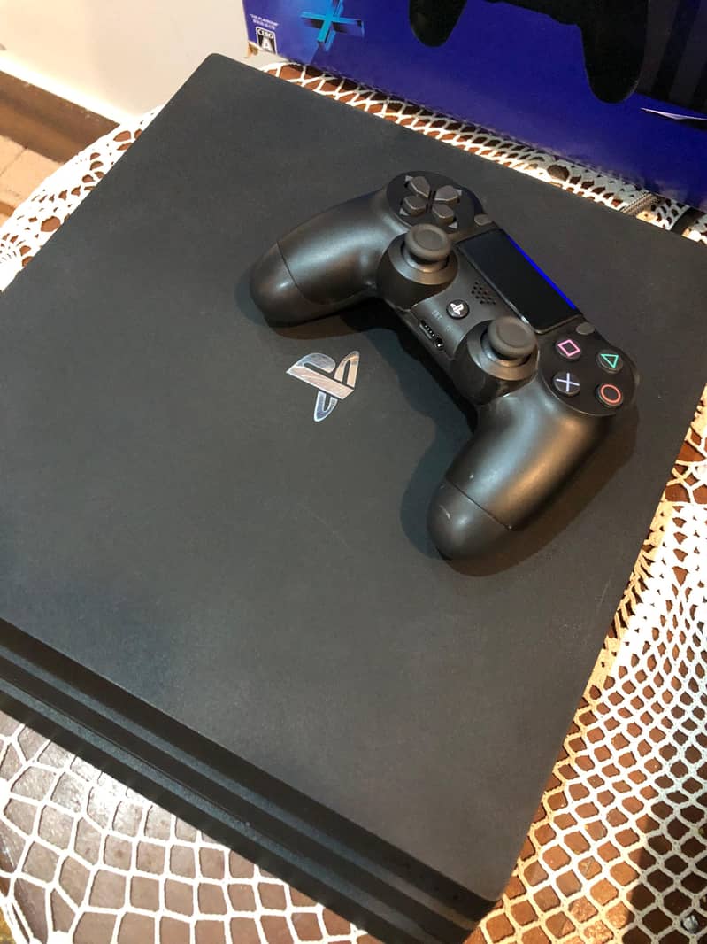 PS4 pro 1tb with original controller 3