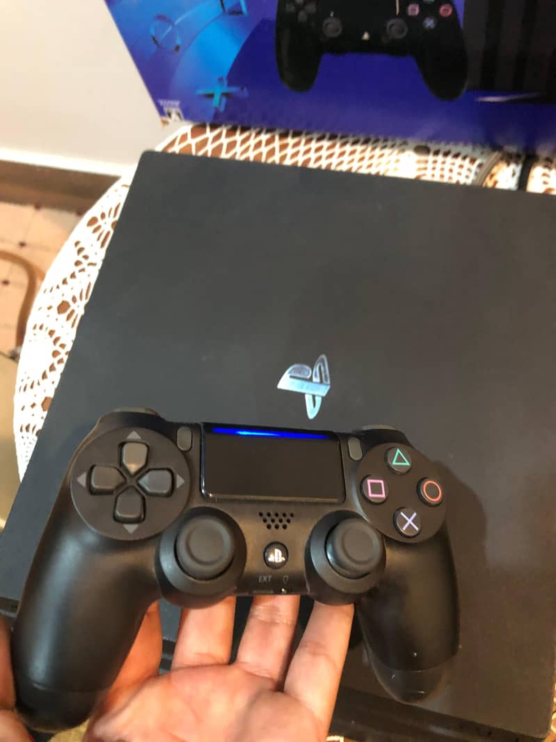 PS4 pro 1tb with original controller 4