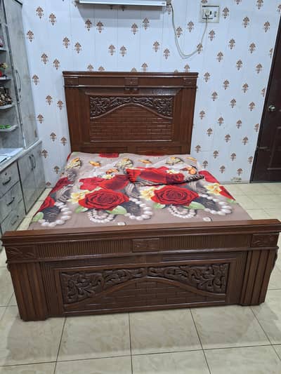 few days used in A + condition Wooden double Bed without Mattress