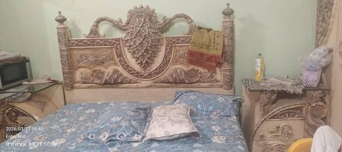 King size bed with side table