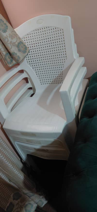 Plastic chair with table