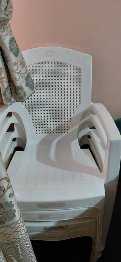 Plastic chair with table