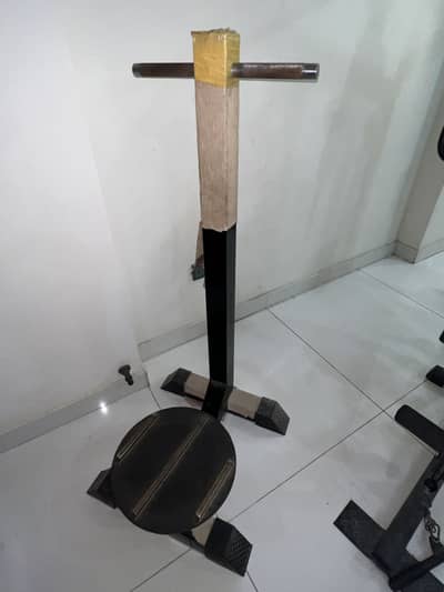 Manual gym twister machine used for waist and tummy exercises.