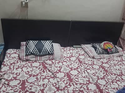 2 single beds with side tables  in affordable price