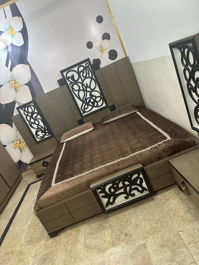 Bed, side tables, dressing, wardrobe and coffee chairs with table