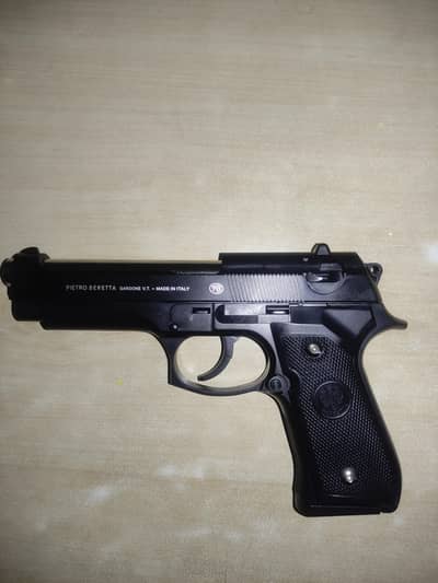 Toy Beretta 92 for kids. made from metal and plastic
