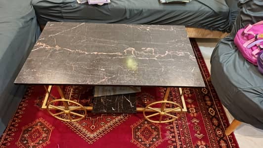 SLIGHTLY USED DUAL LEVEL WOODEN COFFEE TABLE