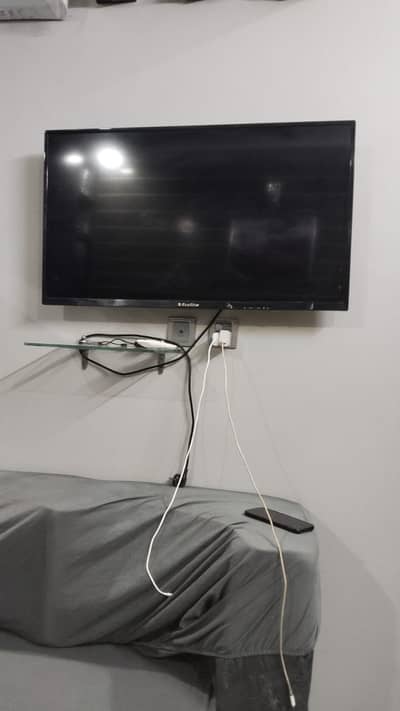 EcoStar LED TV – Wall Mounted, Excellent Condition  Description: