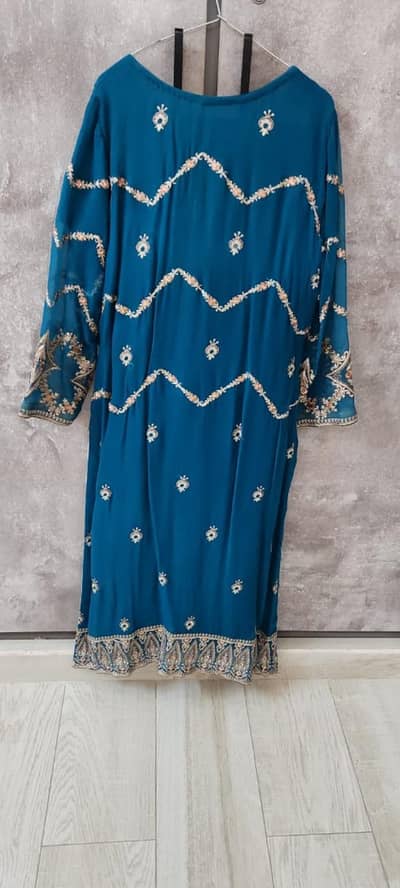 teal blue long shirt with plan trouser and border work duppata