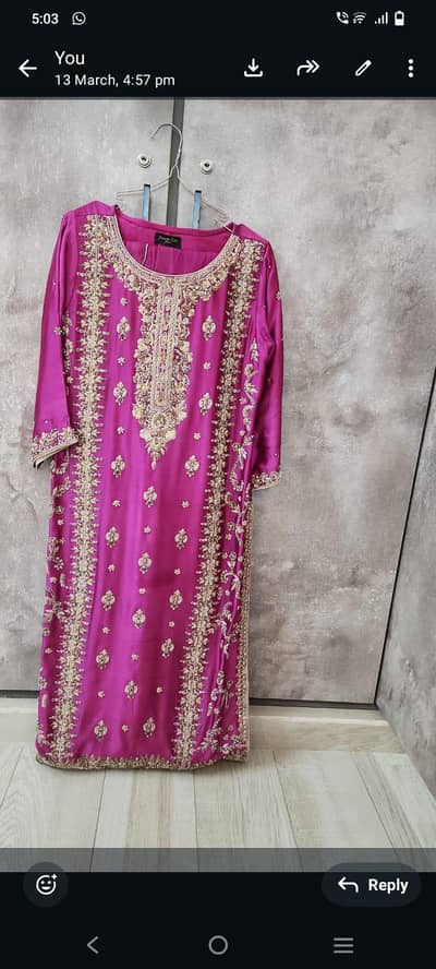 shocking pink colour long shirt with same fabric dupatta and salwar