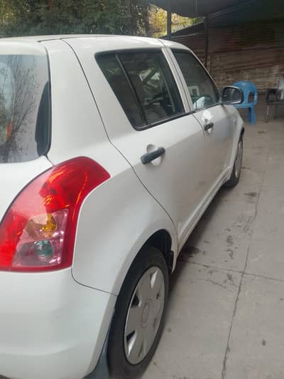 Suzuki swift 2012 , excellent condition AC,power steering rear camera