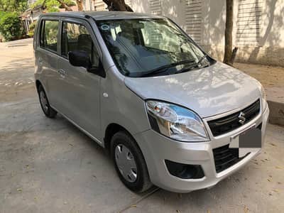 Suzuki Wagon R 2015 first owner Just buy and drive