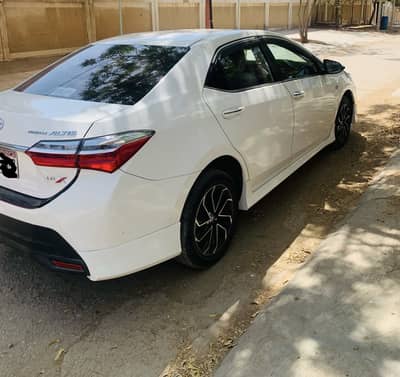 Toyota Corolla Altis Grande 1.8 New Rim beige Interior.
