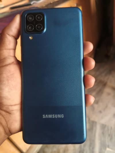 samsung a12 4 64 box nhai hiy chachar bhi nhai hiy bkia Mobil okay hiy
