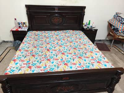 Bed with side tables