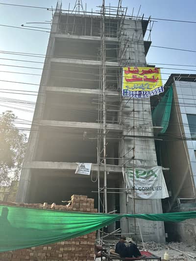 1 KANAL COMMERCIAL PAID 7 STORY BUILDING WITH BASEMENT PARKING