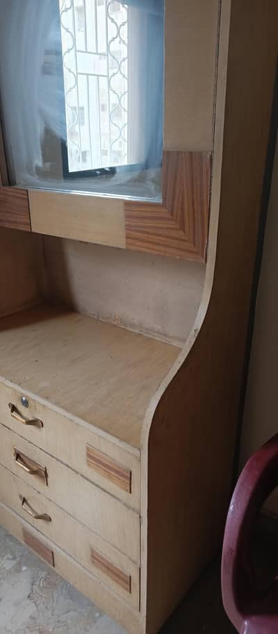 dressing with 4 drawers n 4 shelves. .