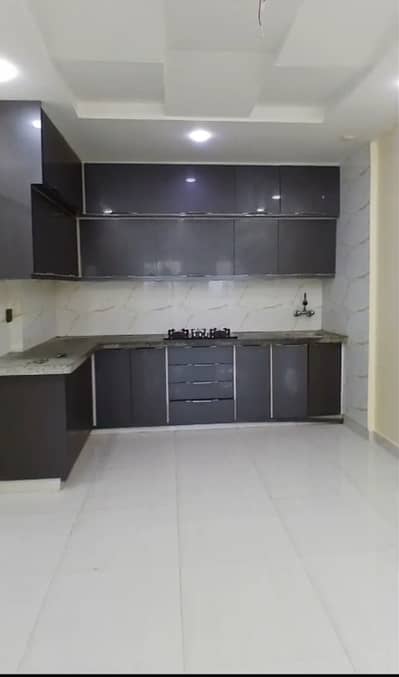 Flat For Sale in Bhayani Heights Ground Floor 2 Bedroom Drawing Lounge American kitchen Tile Floor Key Available anytime visit Your dream flat, make it yours today!