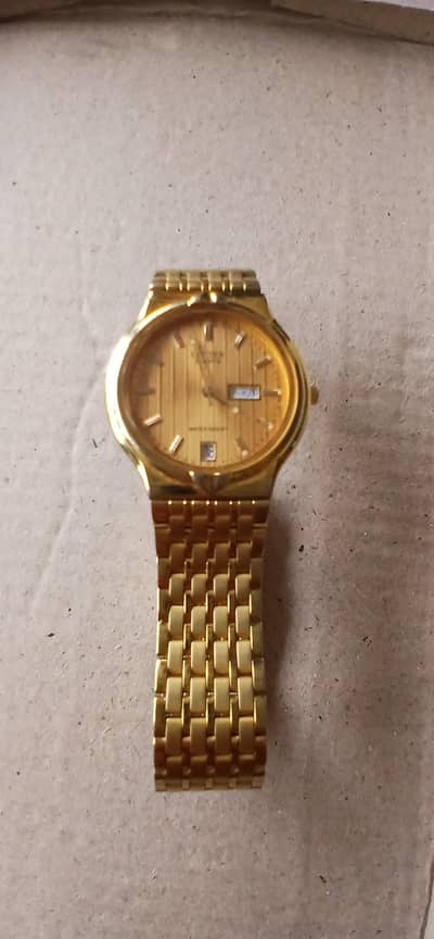 slightly use Original citizen woman watche in Golden colour