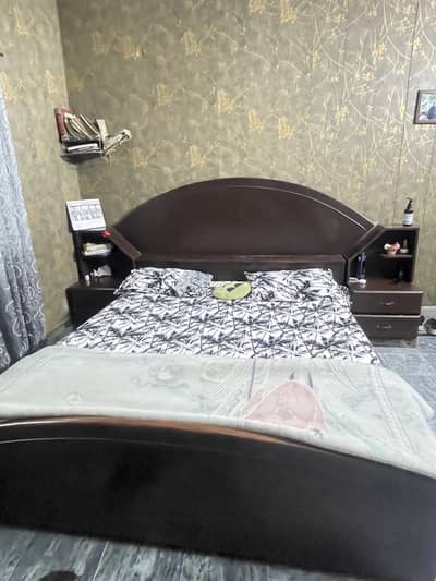 Wodden bed along with side tables