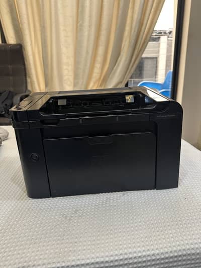 Hp laserjet P1606dn