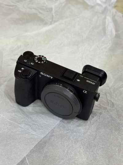 Sony a6500 body with Sigma 30mm 1.4 Lense