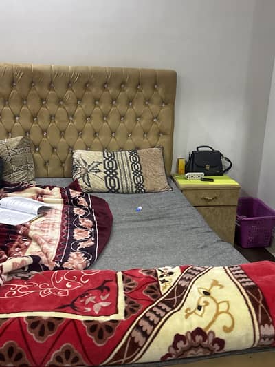 Bed with side table and mattress