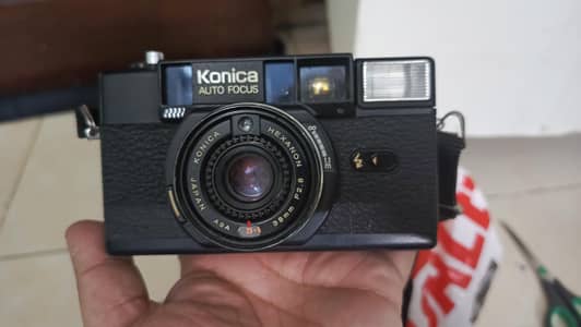 3 antique classic cameras for sale.