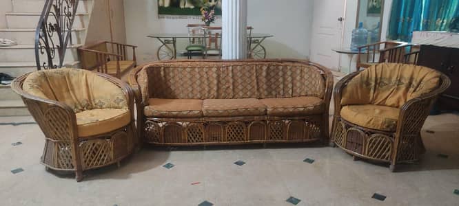 cane sofa set five seater in good condition.